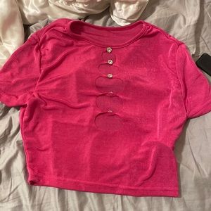pink revealing shirt
